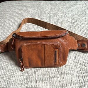 Spikes & Sparrow leather crossbody/waist bag.New without tags three zippers.